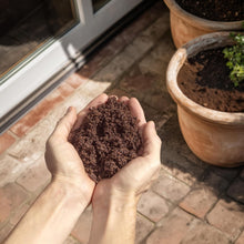 Load image into Gallery viewer, Coconut Coir Potting Soil for Indoor Plants - Expands to 7 Quart (15 lb) | Bonsai Soil Discs Perfect for General Houseplants, Herbs, and Bonsai Trees - Expands with Water