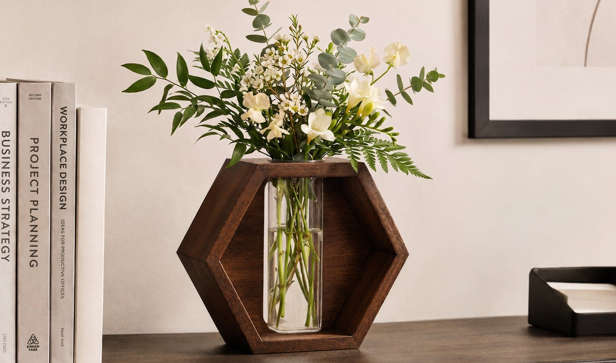 Acacia wood propagation vase with fresh flowers on a shelf